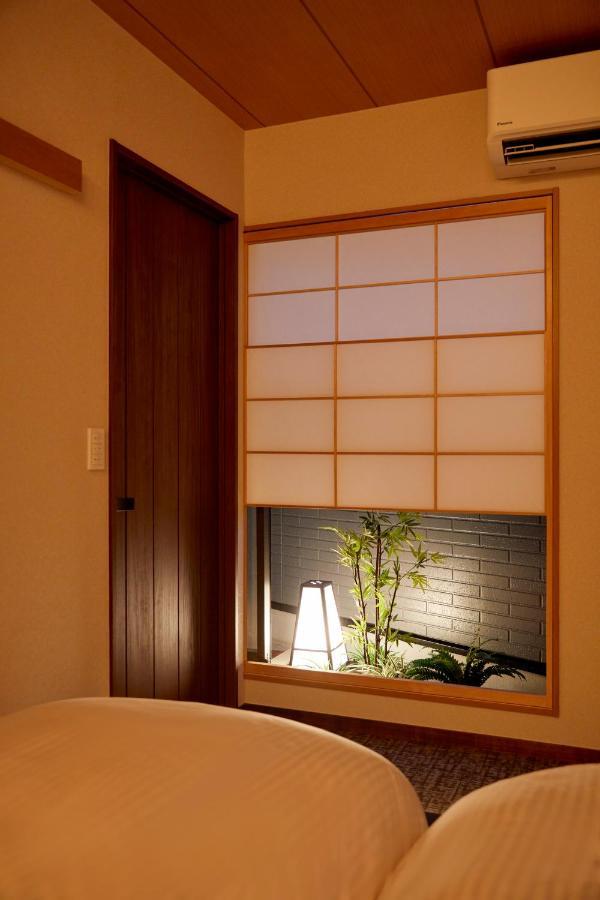 Villa 古今 天下茶屋 With A Private Parking Lot And A Half Open-Air Bath And Direct To Kix à Ōsaka Extérieur photo